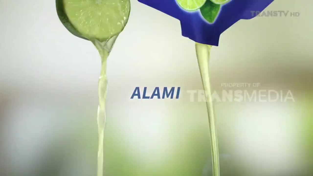 Lime juice streams from a sliced lime and a blue pouch. The Trans TV logo is visible in the background.