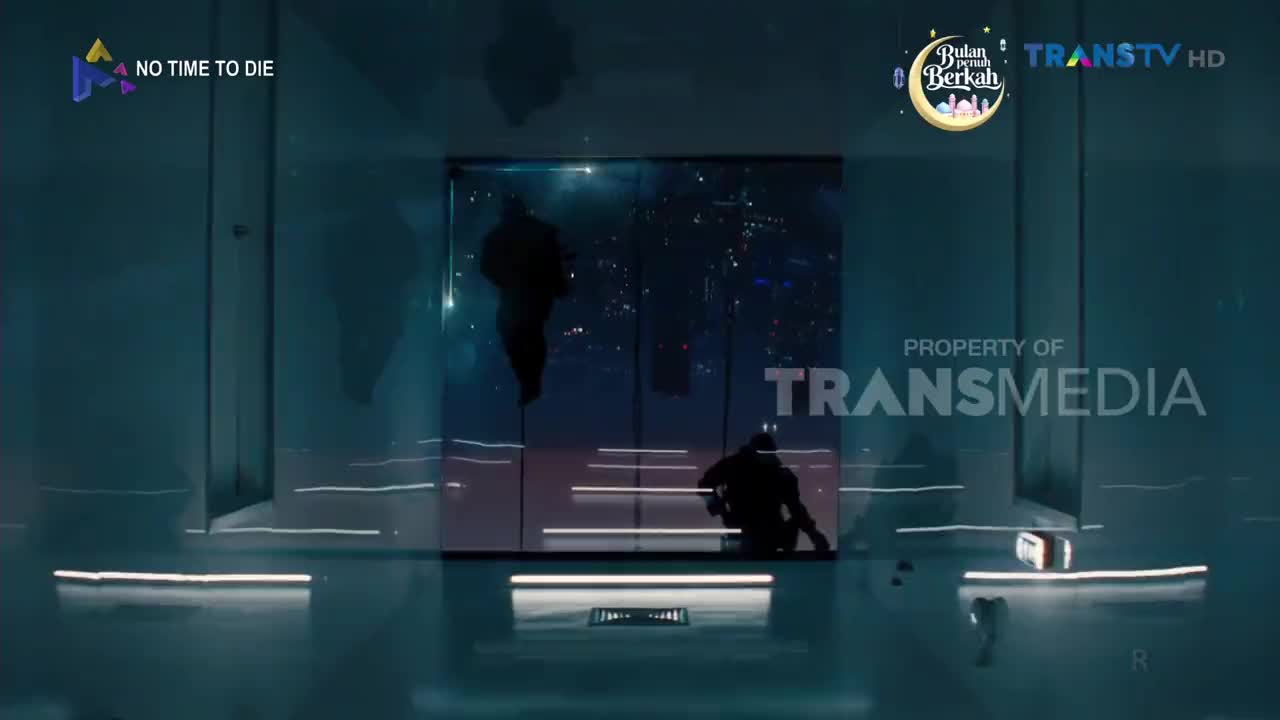 A figure in silhouette crouches on a platform, looking out at a starry expanse. Another shadowy form hangs suspended in the air, framed by the Trans TV logo.