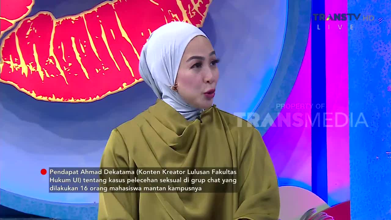 A woman in a hijab and a gold top speaks on a Trans TV broadcast. A graphic in Indonesian overlays the bottom of the screen.