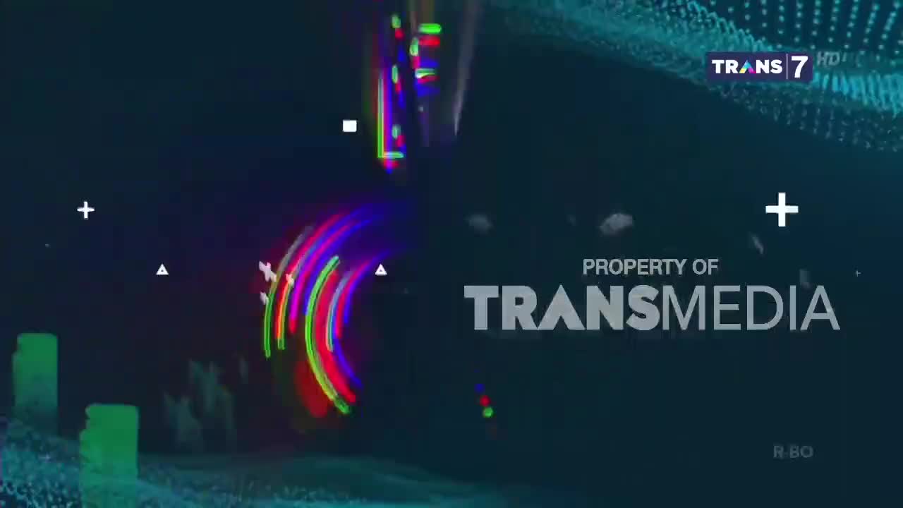 The Trans7 logo sits in the corner, while a colorful, curved streak moves across the screen. Below, "Property of Transmedia" is displayed in large, bold letters.
