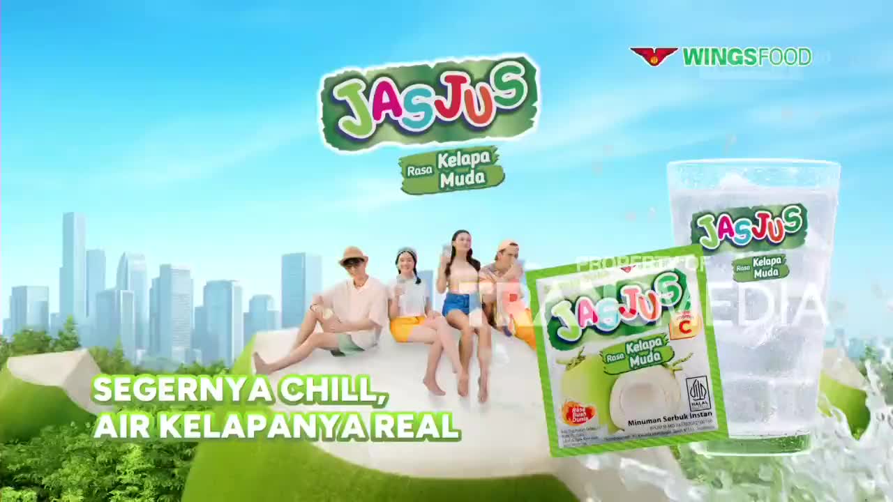 Four young people relax on what looks like a giant coconut, a glass of Jas Jus sits beside a packet of the drink. The sky behind them is a bright blue, with a stylized cityscape in the distance.