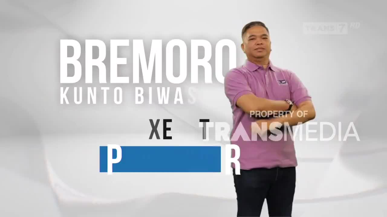 A man stands with his arms crossed, a confident look on his face. Large white text behind him reads "BREMORO KUNTO BIWAS." A man stands with his arms crossed, a confident look on his face. Large white text behind him reads "BREMORO KUNTO BIWAS."