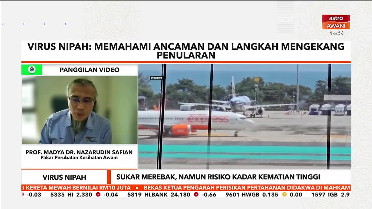 An orange and white airplane sits on the tarmac, its engines quiet. Another plane is visible behind it, parked further down the runway. An orange and white airplane sits on the tarmac, its engines quiet. Another plane is visible behind it, parked further down the runway.