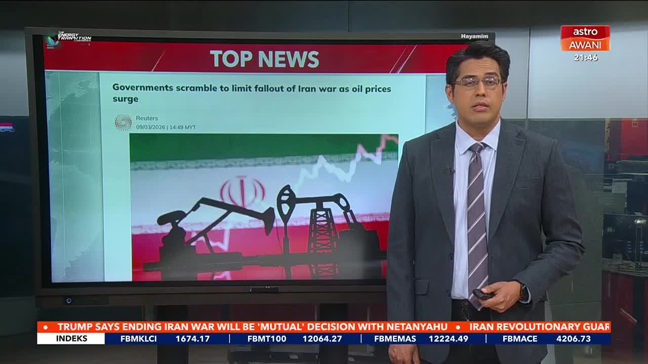 A news anchor stands beside a large screen displaying "TOP NEWS" and a graphic with oil pumps silhouetted against the Iranian flag. The screen's headline reads, "Governments scramble to limit fallout of Iran war as oil prices surge."