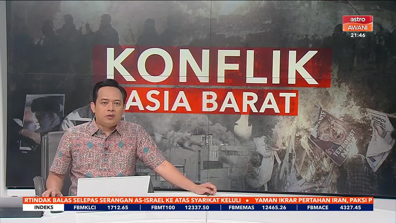 A news anchor sits at a desk, his gaze fixed forward as the Astro Awani broadcast behind him displays "KONFLIK ASIA BARAT" with images of burning papers. One paper clearly shows a face with "TERRORIST" printed across it.
