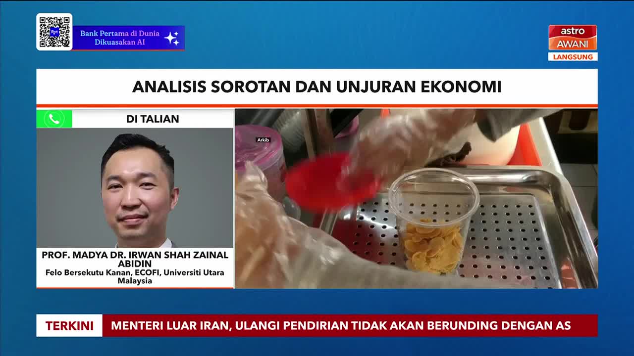 Gloves are being used to scoop cereal into a clear plastic cup. A red lid sits nearby on a metal tray.