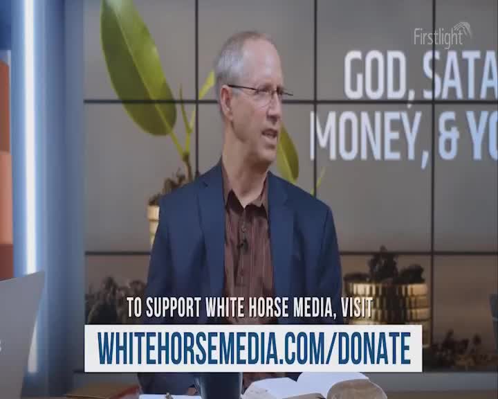 A man in a blue blazer and glasses is speaking, gesturing with his hands. Behind him, the "Firstlight" logo sits above text about God, Satan, and money.
