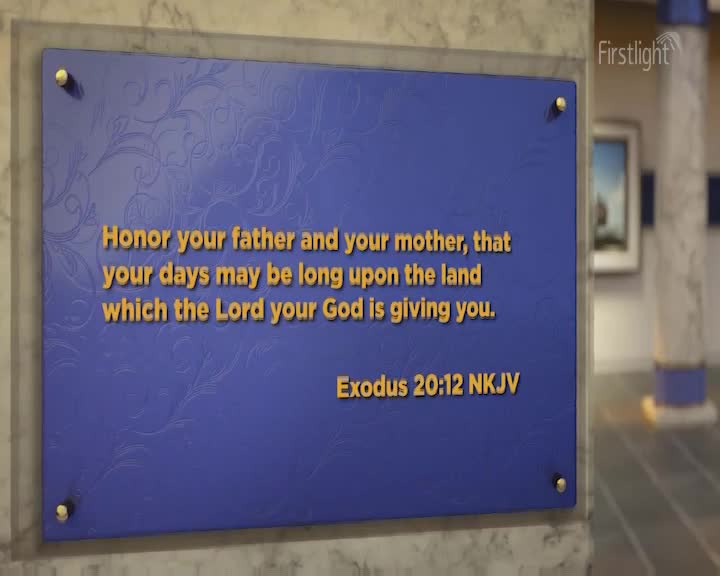 A blue plaque with gold lettering hangs on a marble wall. The text reads, "Honor your father and your mother, that your days may be long upon the land which the Lord your God is giving you. Exodus 20:12 NKJV."