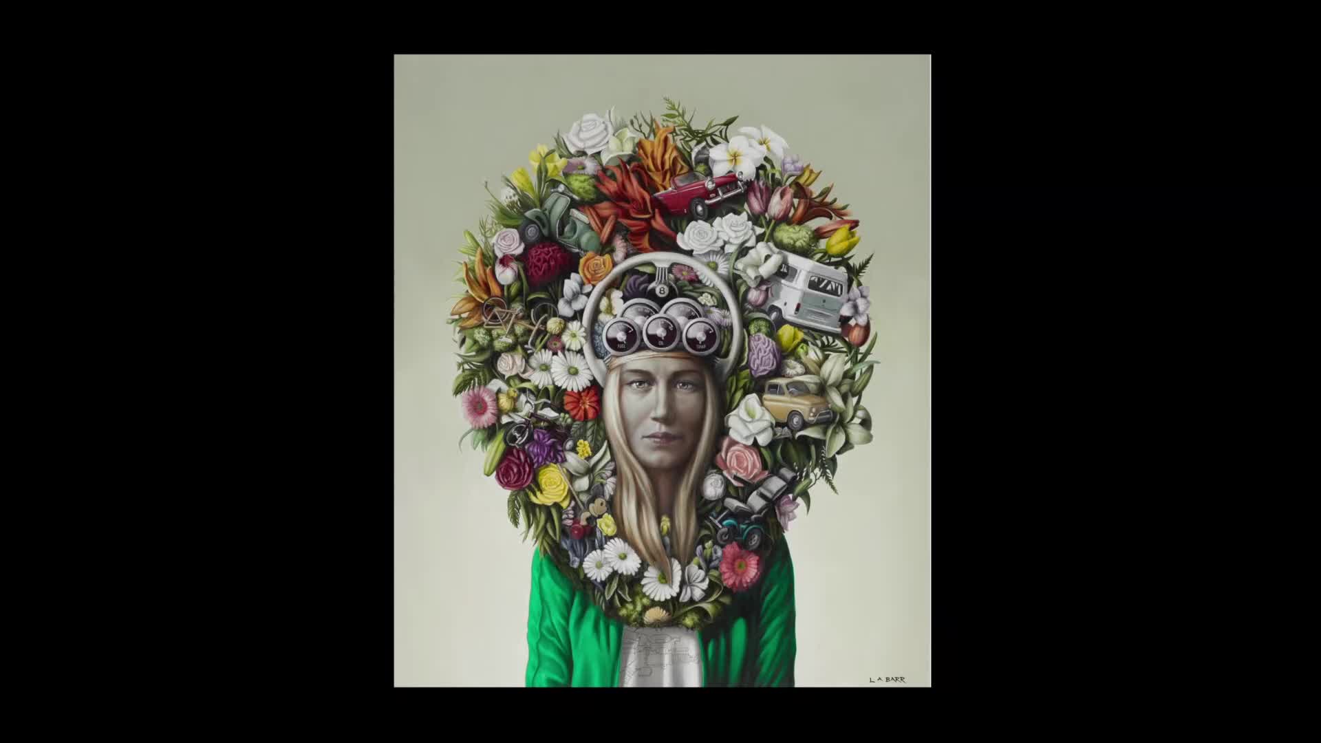 A woman with a serene expression is framed by a halo of flowers, cameras, and miniature vehicles. Her green jacket contrasts with the colorful arrangement that surrounds her face.
