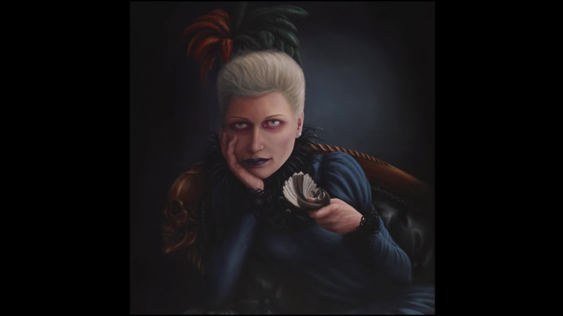 A woman with pale skin and striking makeup gazes directly at the viewer, holding a small fan of cards. Her expression is intense, and she rests her chin on her hand.
