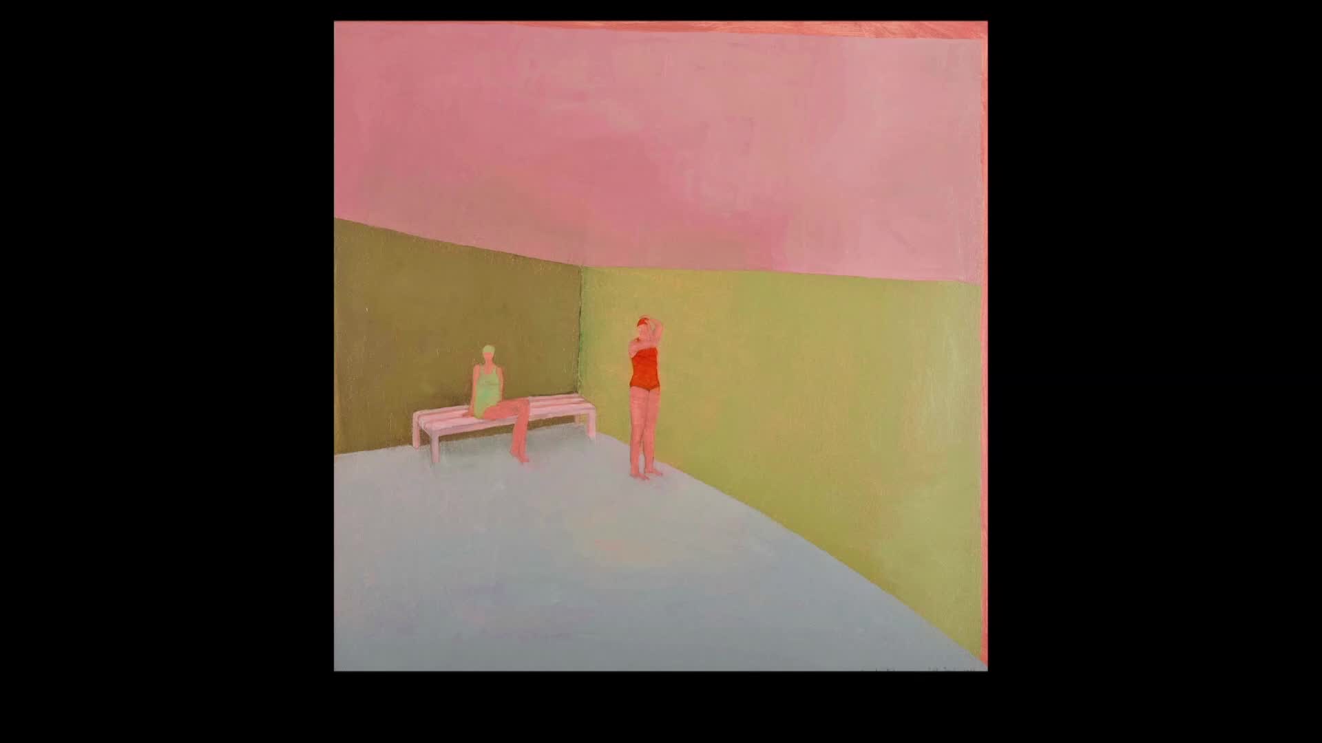 A person in a red swimsuit stands, looking away. Another person sits on a white bench to the left.