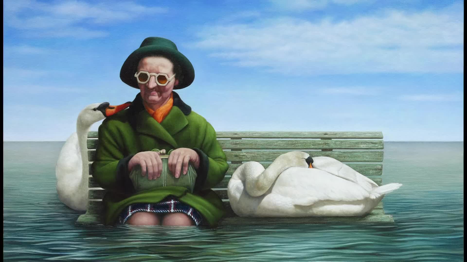 A swan nuzzles the cheek of a person seated on a submerged bench, while another swan sleeps beside them. The water laps gently around the bench, reflecting the clear blue sky. A swan nuzzles the cheek of a person seated on a submerged bench, while another swan sleeps beside them. The water laps gently around the bench, reflecting the clear blue sky.