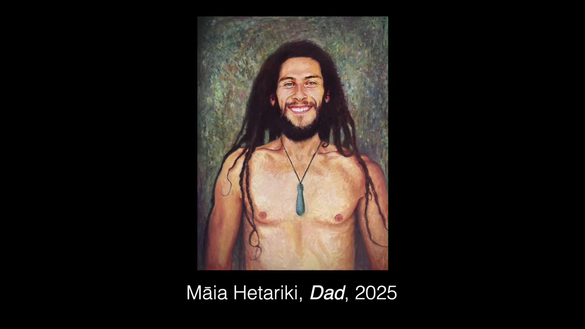 A portrait of a man with long dreadlocks and a pounamu pendant hangs on the wall. The text below identifies him as Māia Hetariki, Dad, 2025.
