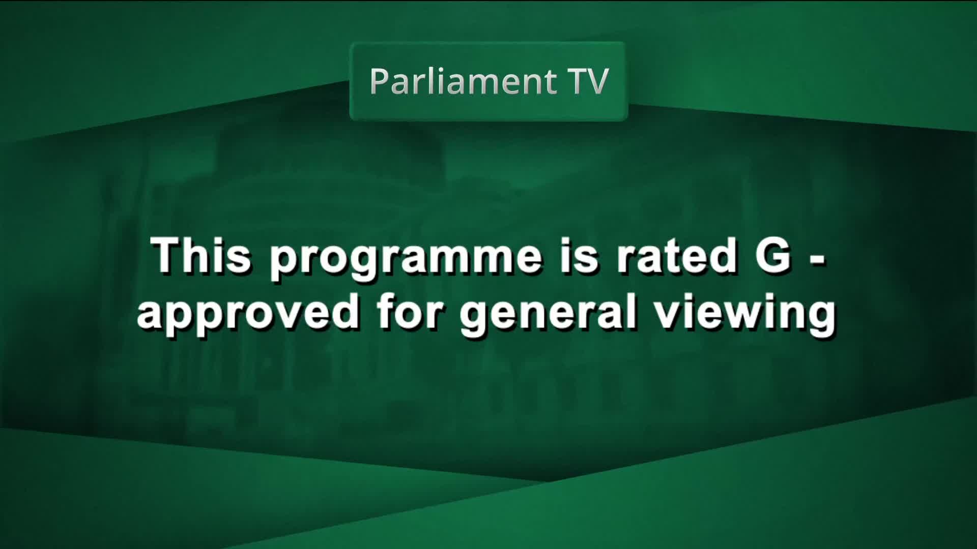 Parliament TV is on screen, displaying a message that this programme is rated G for general viewing. The background shows a blurred image of the New Zealand Parliament buildings.