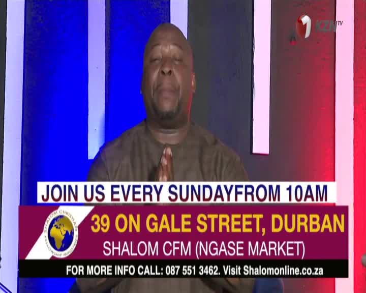 A man in a brown shirt clasps his hands, eyes closed, as the camera focuses on him. Below, a banner on 1KZN TV invites viewers to a service in Durban.
A man in a brown shirt clasps his hands, eyes closed, as the camera focuses on him. Below, a banner on 1KZN TV invites viewers to a service in Durban.