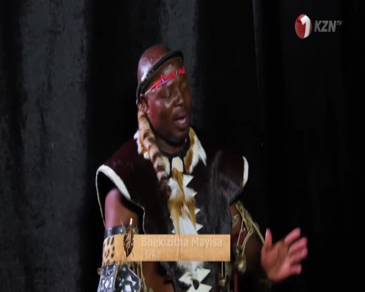 A man in traditional Zulu attire, Bhekizizwe Mayisa, speaks with his right hand raised. The KZN TV logo appears in the upper right corner. A man in traditional Zulu attire, Bhekizizwe Mayisa, speaks with his right hand raised. The KZN TV logo appears in the upper right corner.
