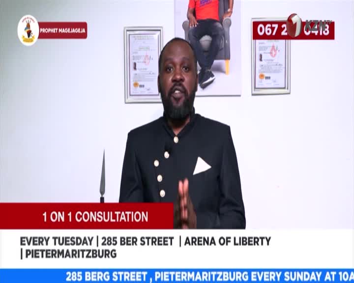 A man in a sharp black jacket speaks directly to the camera. Below him, text announces "1 ON 1 CONSULTATION" and details for Tuesdays in Pietermaritzburg. A man in a sharp black jacket speaks directly to the camera. Below him, text announces "1 ON 1 CONSULTATION" and details for Tuesdays in Pietermaritzburg.