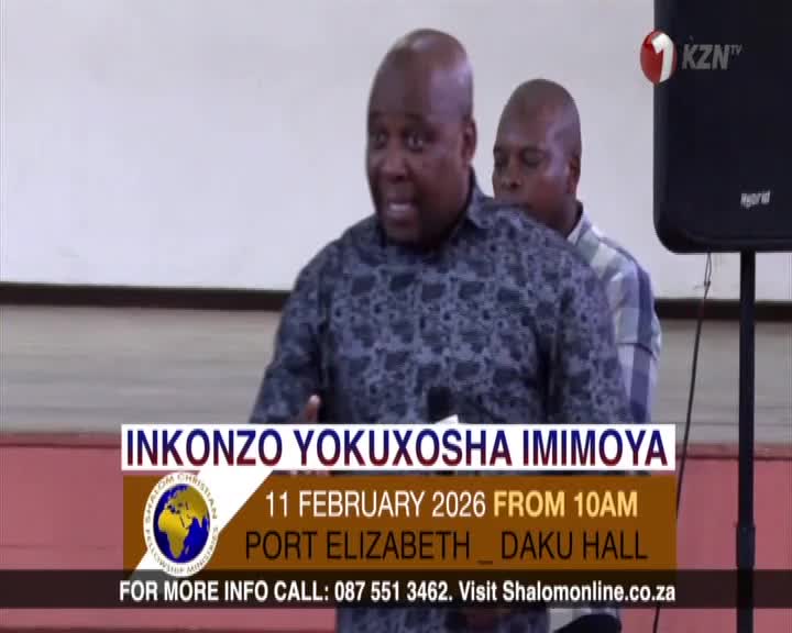 A man in a patterned shirt speaks animatedly behind a podium, while another man stands behind him. A KZN TV logo appears in the upper right corner. A man in a patterned shirt speaks animatedly behind a podium, while another man stands behind him. A KZN TV logo appears in the upper right corner.