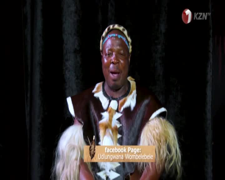 A man in traditional Zulu attire, complete with a leopard-skin headband and fur trim on his garment, speaks directly to the camera. A KZN TV logo appears in the upper right corner.