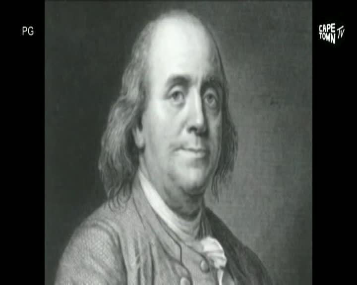 The Cape Town TV logo sits in the corner as a portrait of Benjamin Franklin fills the screen. His gaze is steady, his powdered wig framing his face.
