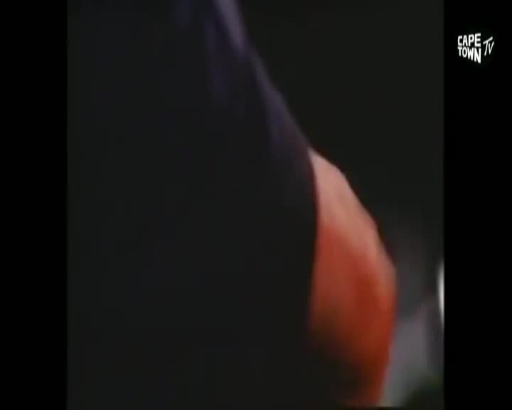 A hand, with a reddish-orange palm, is partially visible against a dark background. The Cape Town TV logo is in the top right corner.
