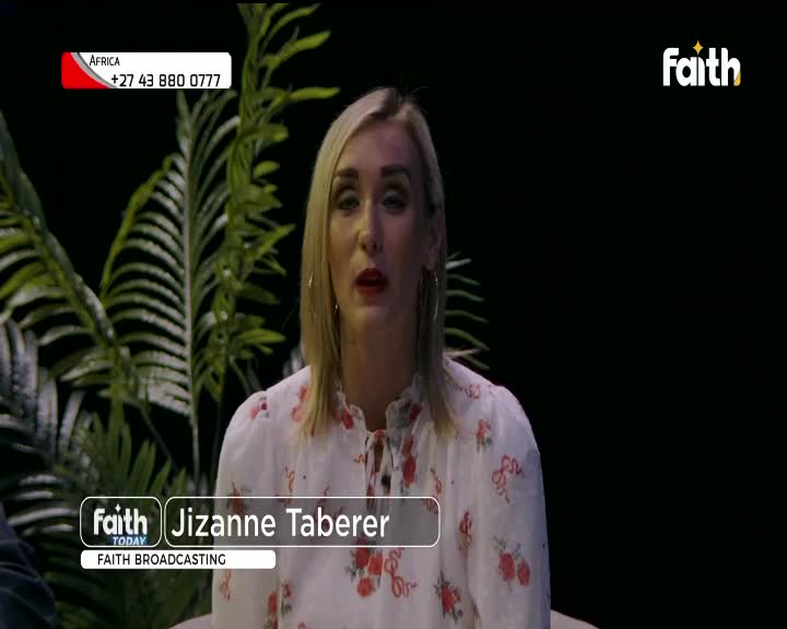 Jizanne Taberer, from Faith Broadcasting, is speaking, her mouth open. A South African phone number is displayed at the top of the screen.
