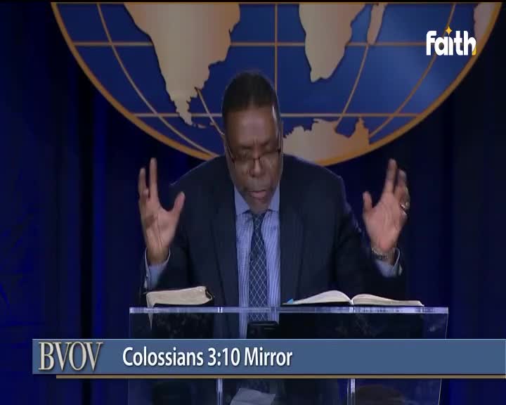A man in a suit gestures with both hands, reading from a book behind a clear podium. The Faith TV logo is visible, and the broadcast is from South Africa.
