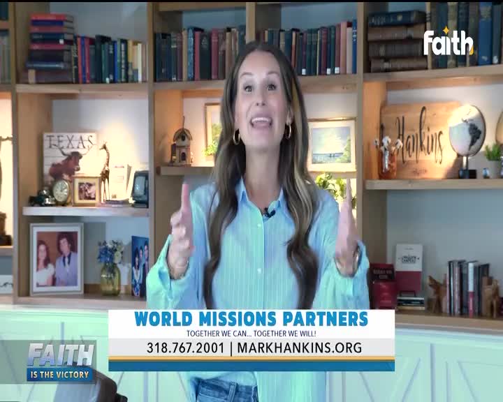 A woman in a light blue shirt gestures with both hands, speaking directly to the camera. Below her, a banner for "World Missions Partners" and Faith TV is displayed.
