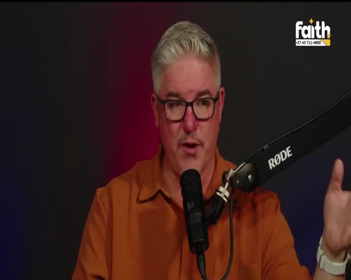 A man with grey hair and glasses speaks into a microphone, his right hand gesturing. The Faith TV logo appears in the top right corner.