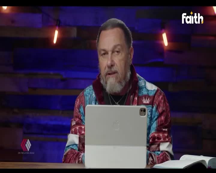 A man with a beard, wearing a colorful jacket, speaks into a camera. A Faith TV logo appears in the corner of the screen. A man with a beard, wearing a colorful jacket, speaks into a camera. A Faith TV logo appears in the corner of the screen.