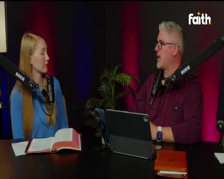 A woman with long blonde hair speaks into a microphone, her eyes cast down towards an open Bible on the table. Across from her, a man with glasses and a maroon shirt gestures as he talks, a tablet and another book before him. The Faith TV logo glows in the corner, a subtle reminder of the broadcast from South Africa.