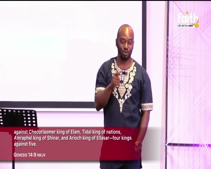 A man in a patterned shirt speaks with conviction, gesturing with his right hand. The Faith TV logo is visible on the right side of the screen.