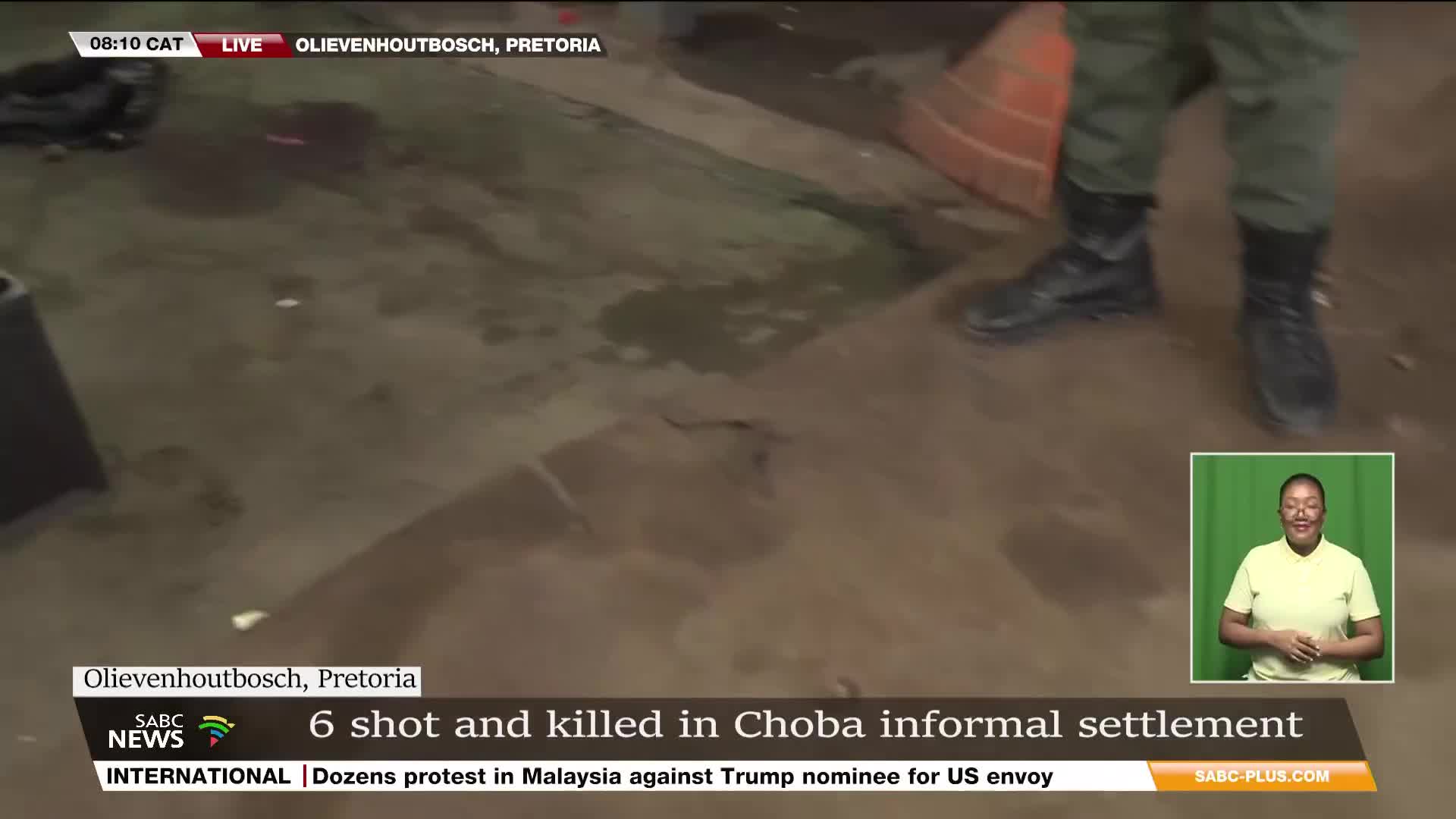 A person in military-style boots stands on a wet, stained surface. The SABC News report from Olivenhoutbosch, Pretoria, details a shooting in the Choba informal settlement.
