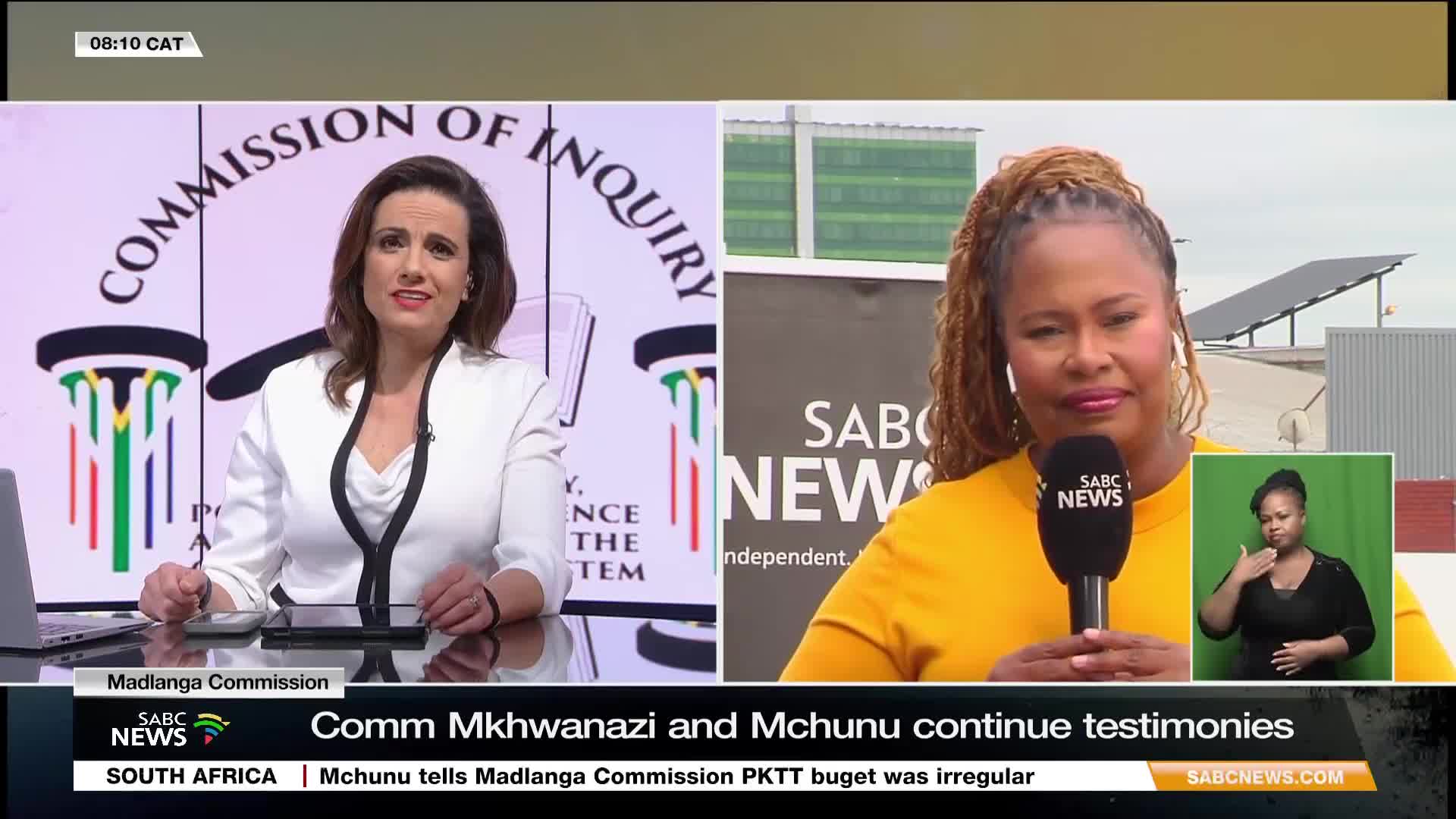On the left, a woman in a white jacket sits at a desk, facing the camera. Beside her, a reporter from SABC News in a yellow shirt holds a microphone, speaking from an outdoor location.
On the left, a woman in a white jacket sits at a desk, facing the camera. Beside her, a reporter from SABC News in a yellow shirt holds a microphone, speaking from an outdoor location.