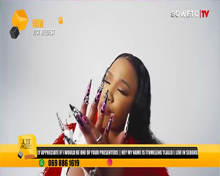 A woman with long, decorated nails gestures gently, her eyes closed. The Soweto TV logo and a "Just Music" graphic are visible in the frame.
