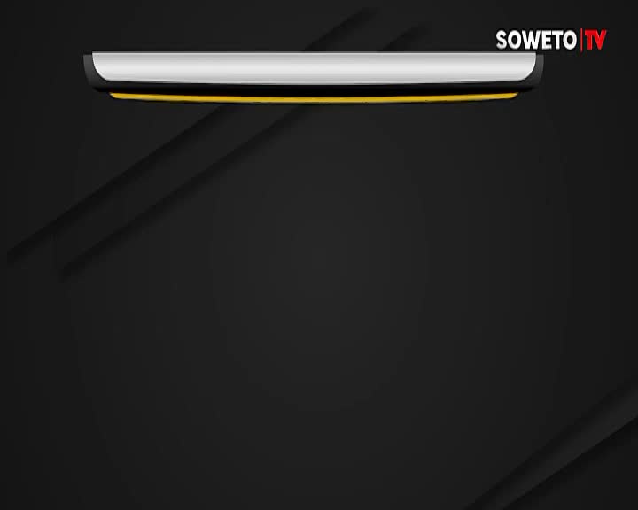 A sleek, silver and yellow bar sits at the top of the screen, the Soweto TV logo visible in the corner. Dark shadows slant across a black background, creating a sense of depth.
