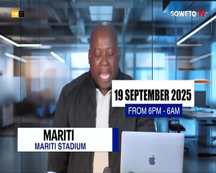 A man in a black jacket speaks animatedly, his mouth open wide. Graphics from Soweto TV flash on the screen, with details about an event at Mariti Stadium.
