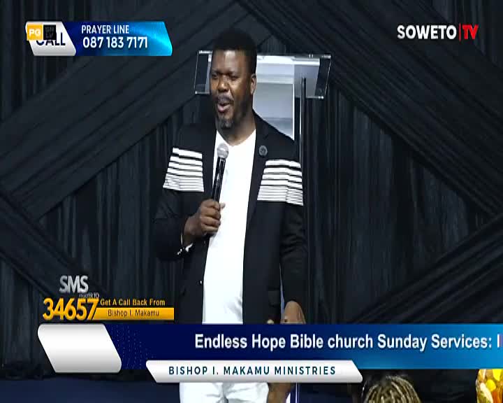 Bishop Makamu, on Soweto TV, is speaking into a microphone, his black jacket accented with white stripes. A graphic at the bottom of the screen identifies the service as "Endless Hope Bible church Sunday Services."
