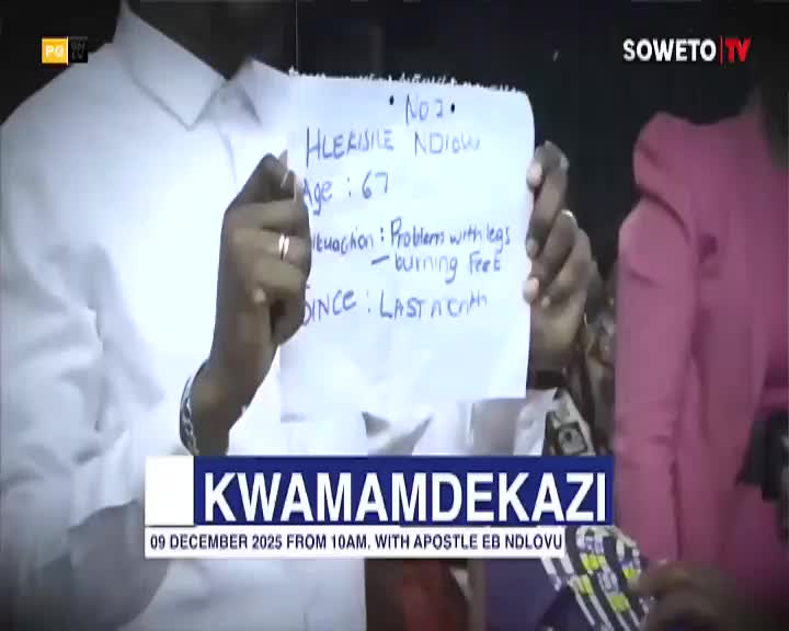 A man in a white shirt holds up a handwritten note detailing a person's age and health issues, likely on Soweto TV. The screen displays the show's name and the date of the broadcast.
