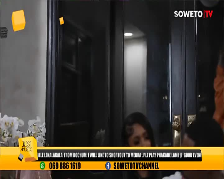 A woman with styled hair leans forward, her face partially obscured. The Soweto TV logo is visible in the upper right corner.