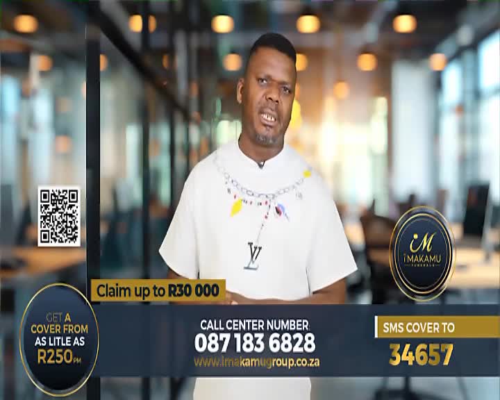 A man stands in front of a blurred office background, speaking directly to the camera. Below him, a graphic displays contact information for i'Makamu Group, including a call center number and an SMS code. A man stands in front of a blurred office background, speaking directly to the camera. Below him, a graphic displays contact information for i'Makamu Group, including a call center number and an SMS code.