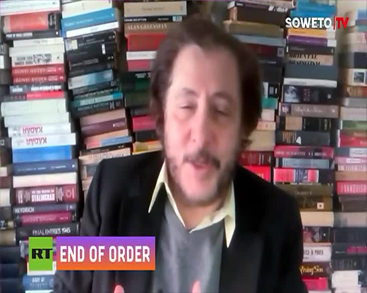 A man speaks in front of a wall of books, a Soweto TV logo visible in the upper right corner. A graphic overlay reads "END OF ORDER" in bold letters. A man speaks in front of a wall of books, a Soweto TV logo visible in the upper right corner. A graphic overlay reads "END OF ORDER" in bold letters.