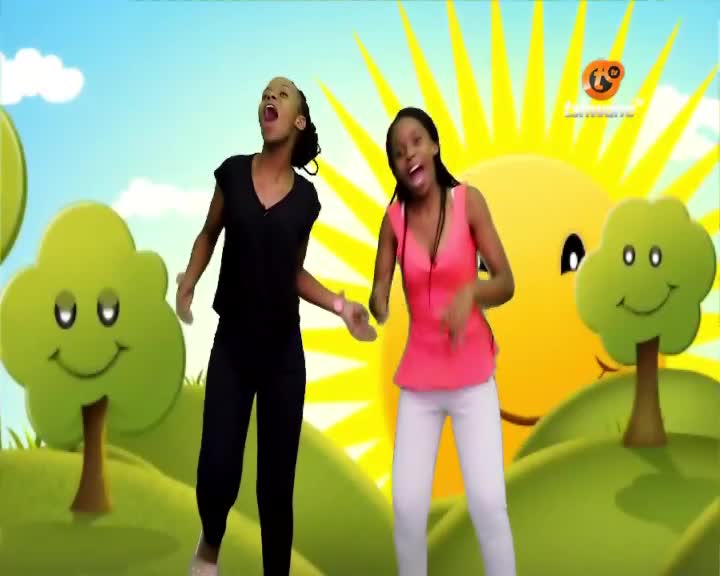 Two young women are dancing in front of a cartoon backdrop, arms and mouths wide open. The bright colours and animated scenery feel like a kids' show on Tshwane TV.
