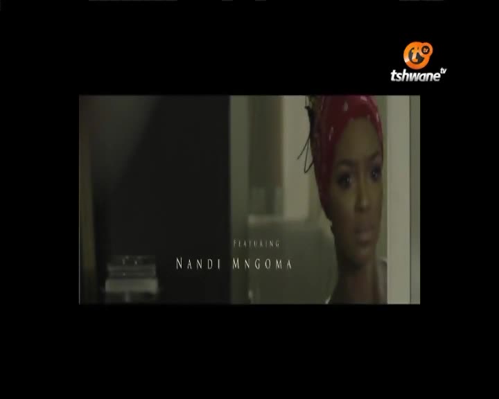 A woman in a red headscarf stares intently, her expression a mix of concern and apprehension. The Tshwane TV logo sits in the corner, and the name "Nandi Mngoma" is displayed.
