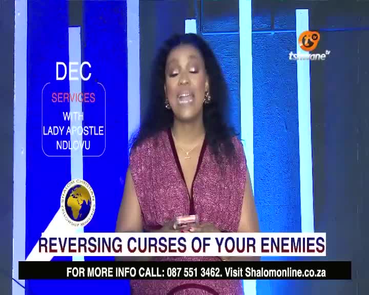 On Tshwane TV, Lady Apostle Ndlovu is speaking, her hands gesturing as she addresses the camera. The screen displays the promise of reversing curses, with contact information for those interested.
