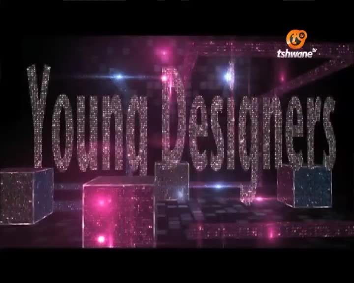 The Tshwane TV logo sits in the corner as the words "Young Designers" shimmer with pixelated light.  Pink and blue light beams flash across the screen, illuminating the cubic platforms.

