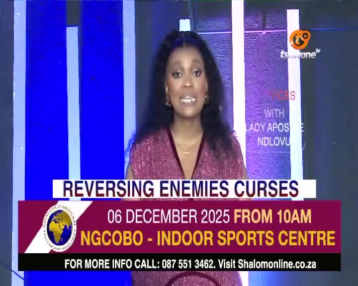 On Tshwane TV, a woman with curly hair speaks earnestly, framed against a blue backdrop. A lower third graphic promotes a religious event in Ngcobo, South Africa, with the theme of "Reversing Enemies Curses."
On Tshwane TV, a woman with curly hair speaks earnestly, framed against a blue backdrop. A lower third graphic promotes a religious event in Ngcobo, South Africa, with the theme of "Reversing Enemies Curses."