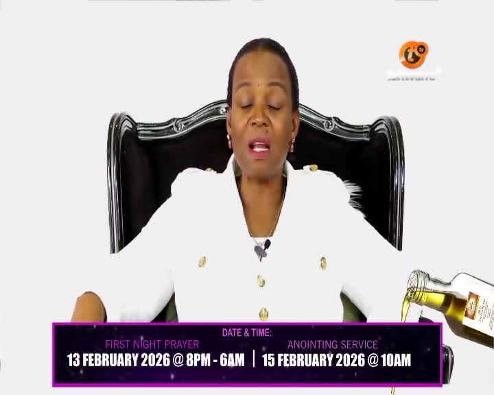 A woman in a white jacket speaks from a large black chair, her eyes closed. A bottle of oil pours its contents onto a purple banner displaying event details.