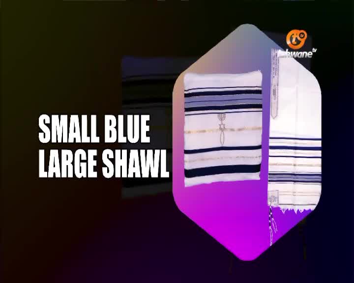 The Tshwane TV logo hovers over a display of prayer shawls. A large white shawl with blue and gold stripes hangs to the right, while a smaller, folded one sits to the left. The Tshwane TV logo hovers over a display of prayer shawls. A large white shawl with blue and gold stripes hangs to the right, while a smaller, folded one sits to the left.