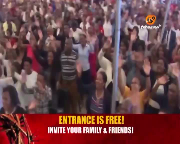 A large crowd in Tshwane raises their hands, some in prayer, others in applause. The Tshwane TV logo is visible above the enthusiastic gathering. A large crowd in Tshwane raises their hands, some in prayer, others in applause. The Tshwane TV logo is visible above the enthusiastic gathering.